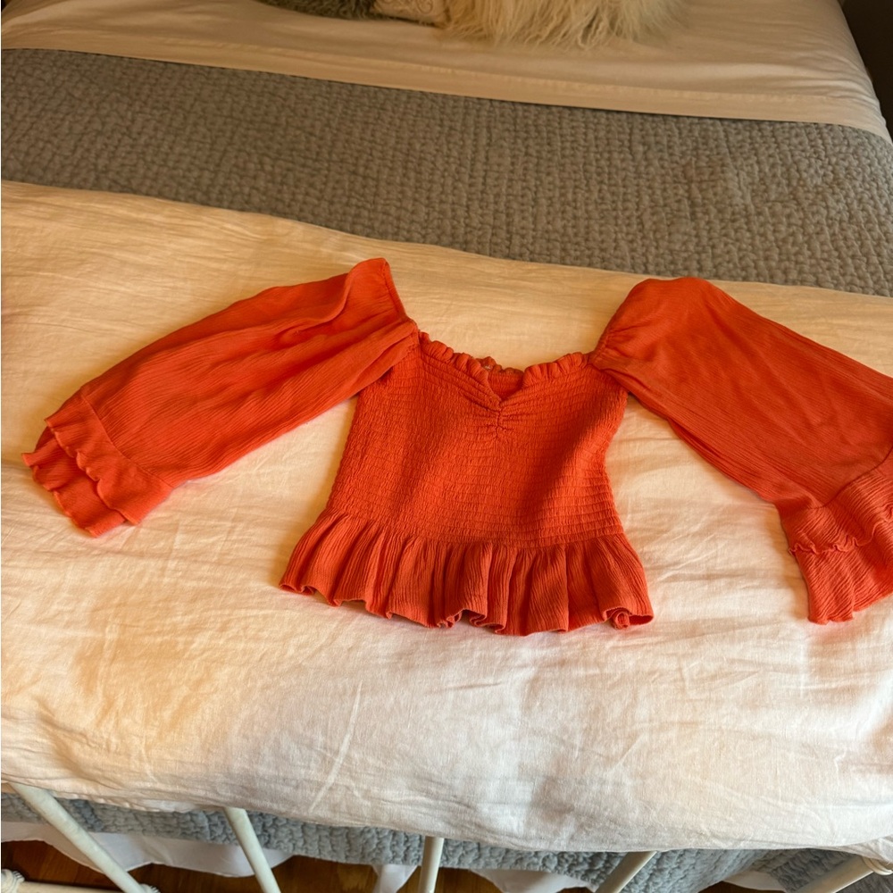 Vibrant Orange Blouse with Ruffled Sleeves